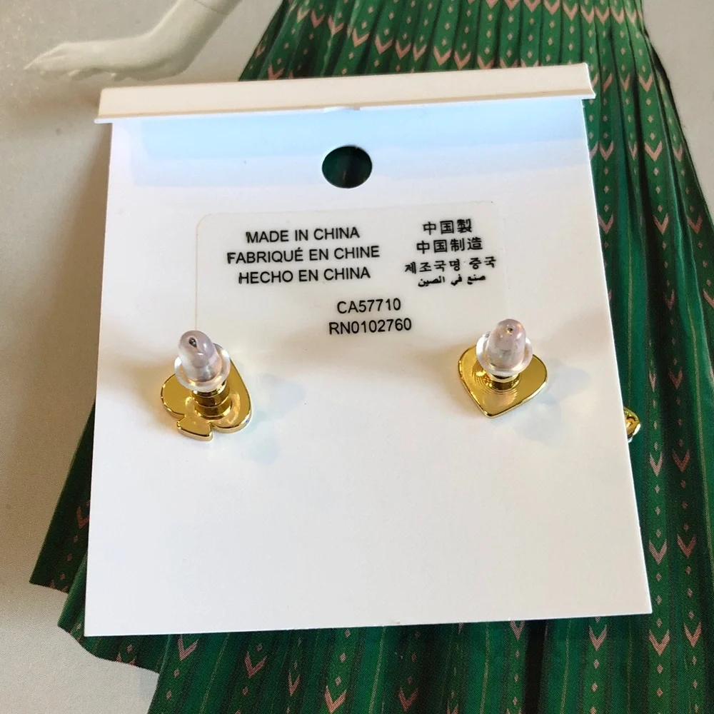 Authentic kate spade New on card White Petal & Gold Center Daisy Stud Earrings
